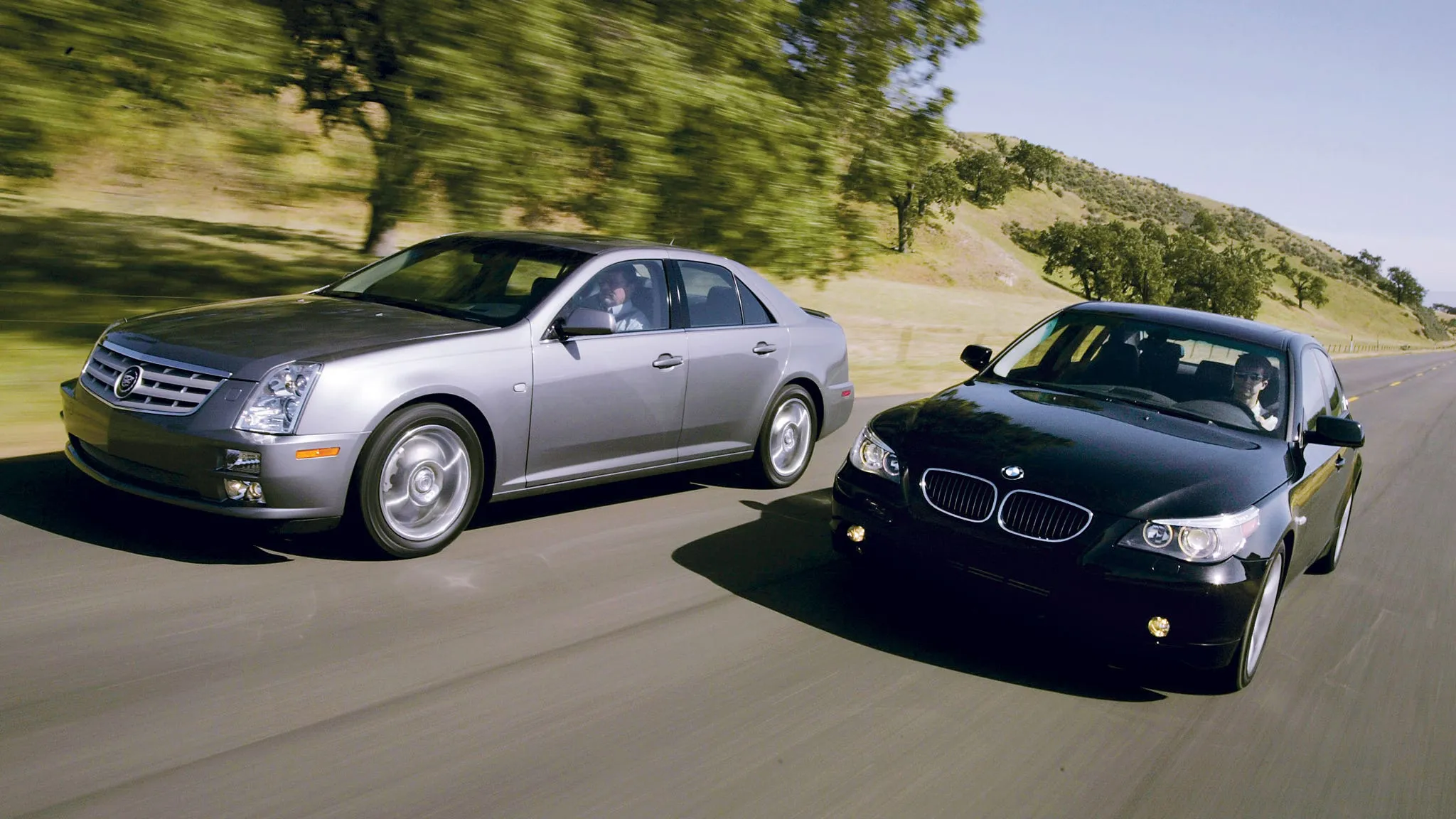 Cadillac STS and BMW 545i face off in a high-performance luxury sedan comparison