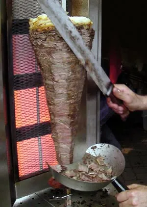 Doner kebab profile highlighting its journey from Ottoman rotisseries to global fast food