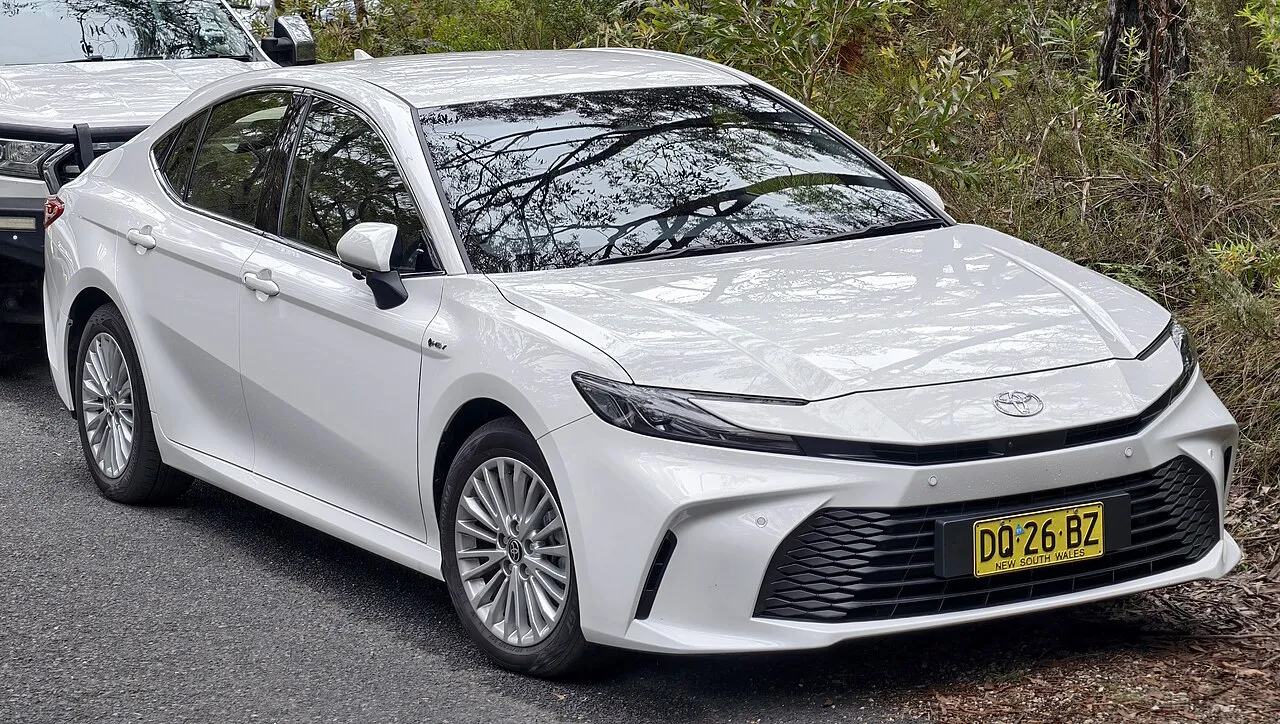 The evolution and history of the sedan automobile from early designs to modern road standards