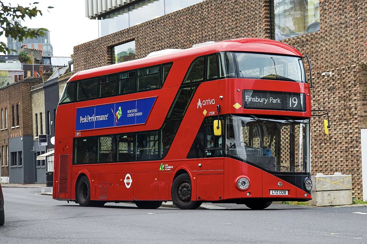 The evolution of the bus from historic horse-drawn carriages to modern urban transit fleets