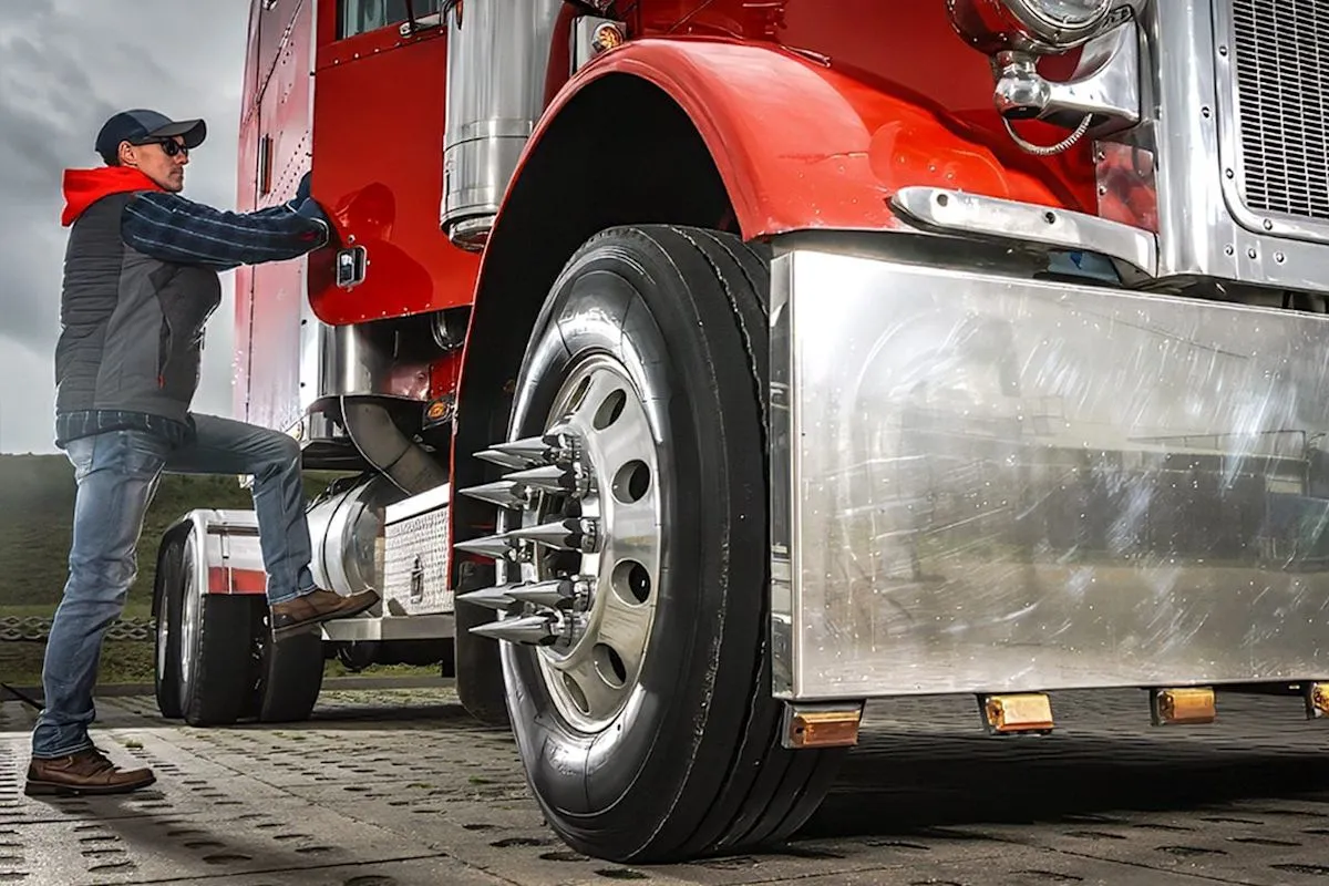 Explanation of long spikes and decorative lug nut covers seen on semi-truck wheels