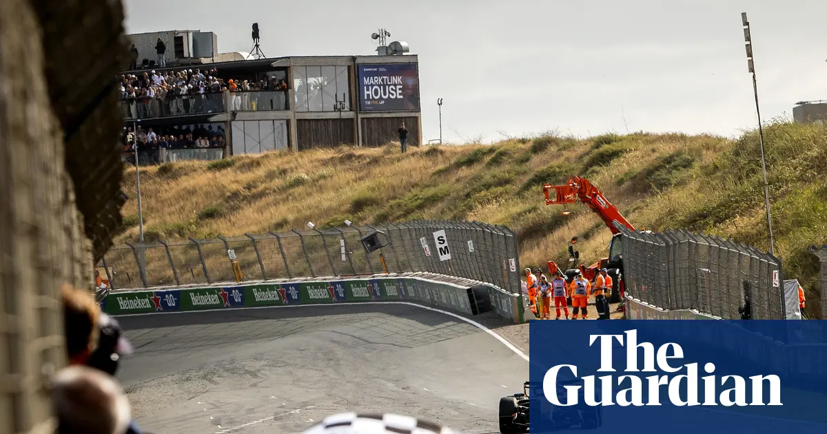 Lando Norris celebrates winning the Dutch Grand Prix ahead of Kimi Antonelli at Zandvoort