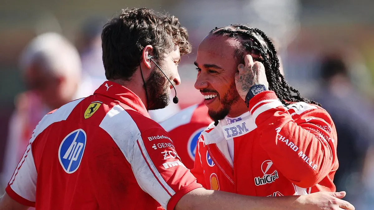 Lewis Hamilton celebrates taking pole position for the Silverstone sprint race