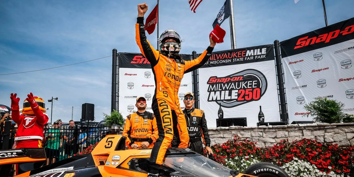 Pato O'Ward celebrates victory at the Milwaukee Mile during chaotic IndyCar doubleheader