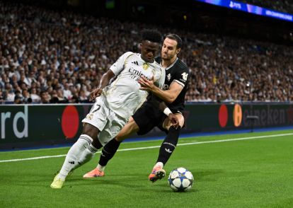 Vinicius Junior of Real Madrid beraksi di lapangan hijau.