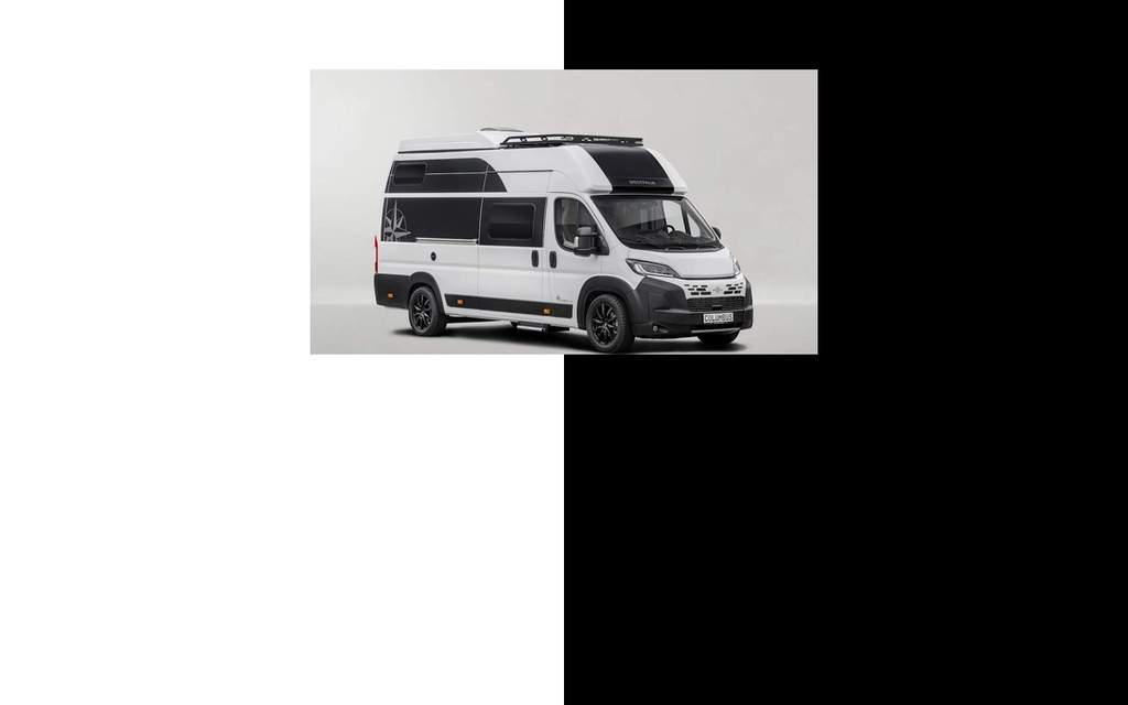 Un camping-car Westfalia Columbus Liner blanc équipé de son toit relevable